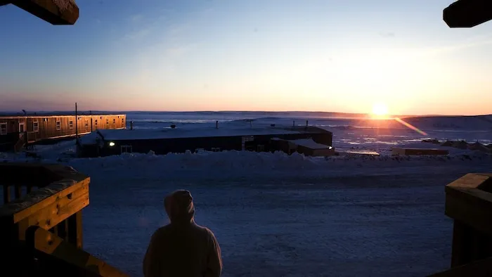 A person leaves the housing facilities at The Meadowbank Gold Mine located in the Nunavut Territory of Canada on Monday, March 23, 2009.Ten years after the creation of Nunavut, an economy that no longer depends on handouts from Ottawa is still struggling to emerge. But if there is optimism, it is here with the construction of a new gold mine that many hope will be the first in a string of such projects from east to west, exploiting some of the richest deposits anywhere in the world. Some, howev