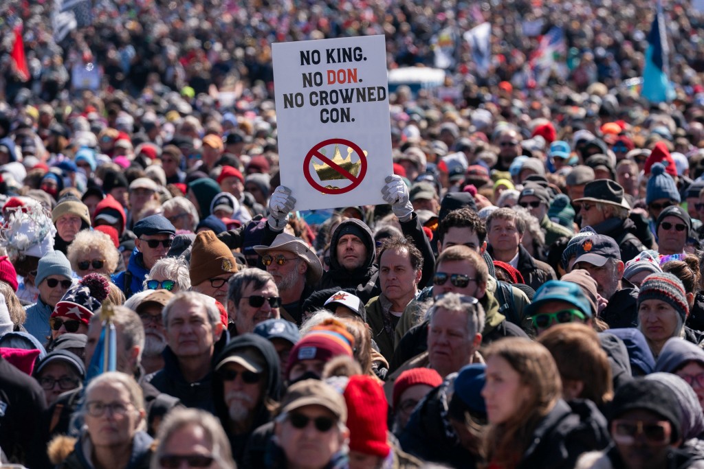 2026-03-28T211624Z_269982051_RC2VDKAWK9E8_RTRMADP_3_USA-TRUMP-PROTESTS-20260329-084518-69c9490eaffe6